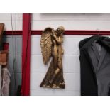 An Art Nouveau style gilt resin wall plaque of an angel, 76cm tall approx.