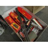 A box containing mixed Hornby locomotives, rolling stock, buildings,