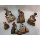 Six sets of animal figures including dogs, pigs, sheep,