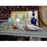 A blue glass decanter with stopper, a large mottled glass Murano fish a/f,