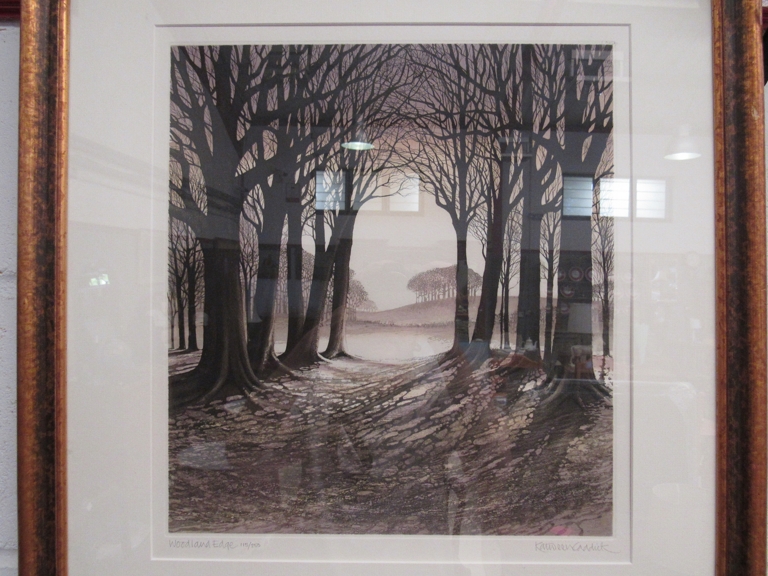 A framed and glazed Kathleen Caddick coloured etching 'Woodland Edge' pencil signed limited edition