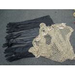 A 1920's style beadwork and simulated pearl shawl together with nylon evening gloves