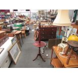 A mahogany standard lamp with dished tray,