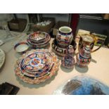 A quantity of modern Imari style china to include charger, bowls, vase etc.