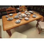 A large modern pine dining table,