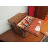 A counterlever sewing box with contents