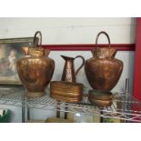 A pair of copper twin spouted vessels, jug,