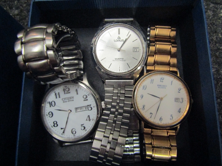 A selection of watches including a Citizen Eco-Drive, Seiko quartz,