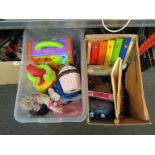 Two boxes containing nursery toys,