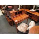 A Georgian style lady's walnut veneer writing desk with pigeon hole and drawer raised back,