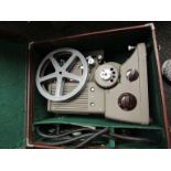 Three cased cine and slide projectors