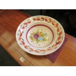 An Italian pottery bowl with floral design,