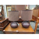 A pair of Next table lamps with brown dimpled bases and brown shades
