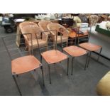A set of four Ladderax dining chairs, stripped back to bare metal with new tan leather seats.
