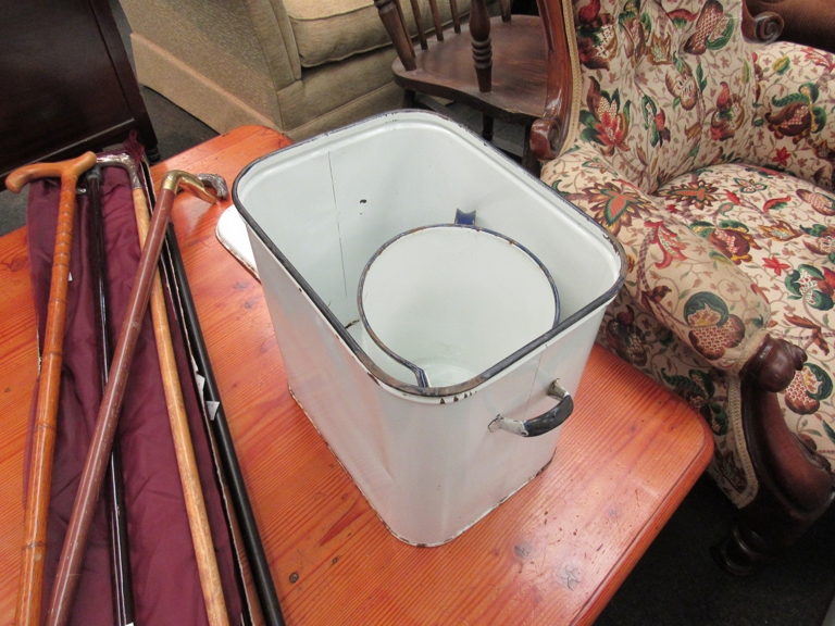 An enamel bread bin and matching jug