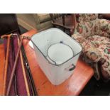 An enamel bread bin and matching jug