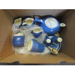 A box containing Devon Ware to include teapot, jugs,