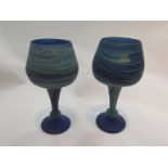 A pair of blue glass goblets with turquoise overlay, unmarked, 19.