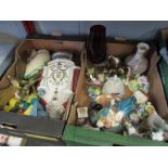 Three boxes containing a quantity of assorted items including ceramic figures, posies,