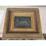 A gesso framed bronze effect high relief plaque depicting gundog,