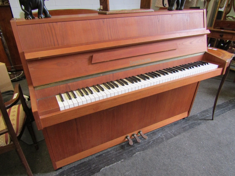 A Zimmermann upright piano in teak