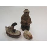 Three Tremar Cornish pottery figures - Fisherman, boat and hedgehog, tallest 11.