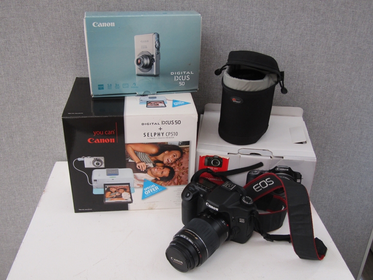 A Canon EOS 40D digital SLR camera with 55-200mm and EFS 17-85mm lenses. box and accessories.