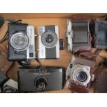 A box of miscellaneous cameras including Braun Super Paxette,