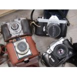 Four cameras including Koroll and Pentax Spotmatic SPII SLR