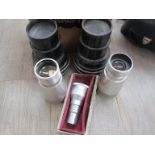 A collection of projection lenses including two Zeiss cinemascope Anamorphot and Bell & Howell