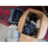 A box of photographic equipment including Canon T50 SLR,