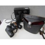 A pair of Asahi Pentax 8x40 wide field binoculars and Pentax 16x50 model 6010 binoculars,