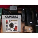 A box of miscellaneous cameras including Kodak folding,