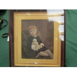 A 19th Century photograph portrait of seated girl with doll, highlighted,