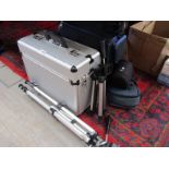 A quantity of camera cases and two tripods