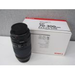 A Canon EF 70-300mm USM ultrasonic zoom lens,