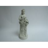 A Parian ware figure of a lady carrying grapes,