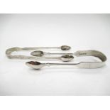 Two pairs of Georgian silver sugar tongs including bright-cut design, one London 1837,