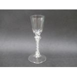 A mid 18th Century wine glass,