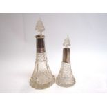 Two silver collared cut glass perfume bottles of spear form