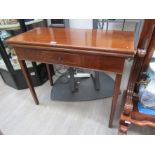 A late Victorian mahogany tea table, the fold over top over single slim drawer,
