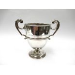 A Robert Pringle & Sons silver trophy, twin scrolled handles joining a banded body,