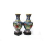 A pair of large Chinese cloisonné vases on plinth bases. Total 44cm high.