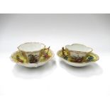 Two similar 19th Century Dresden yellow ground cups and saucers