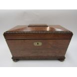 A William IV rosewood tea caddy of sarcophagus form, fitted interior, beaded rim,