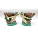 A pair of Minton Majolica comports depicting mer-people, 23cm high,