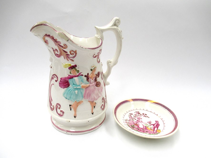 A pink lustre edged earthenware "Polka" jug,