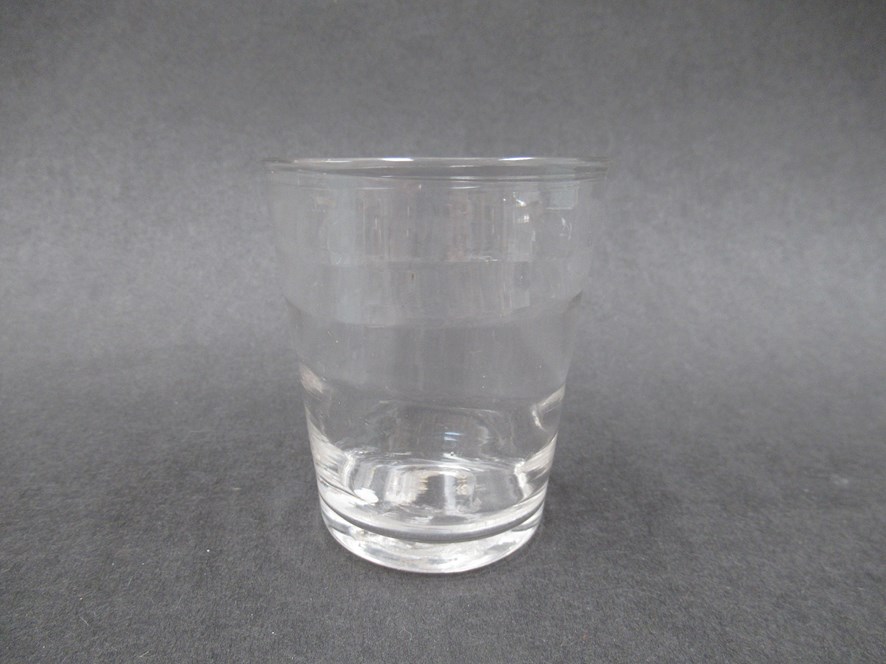 A late 18th Century clear glass "Lynn beaker",