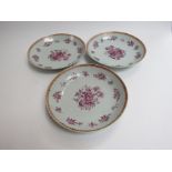 In the style of New Hall, three late 18th Century dishes with puce floral design,
