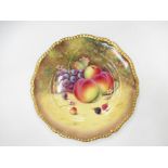 A Royal Worcester handpainted fruit study plate with gilt embellishment, painted by P.